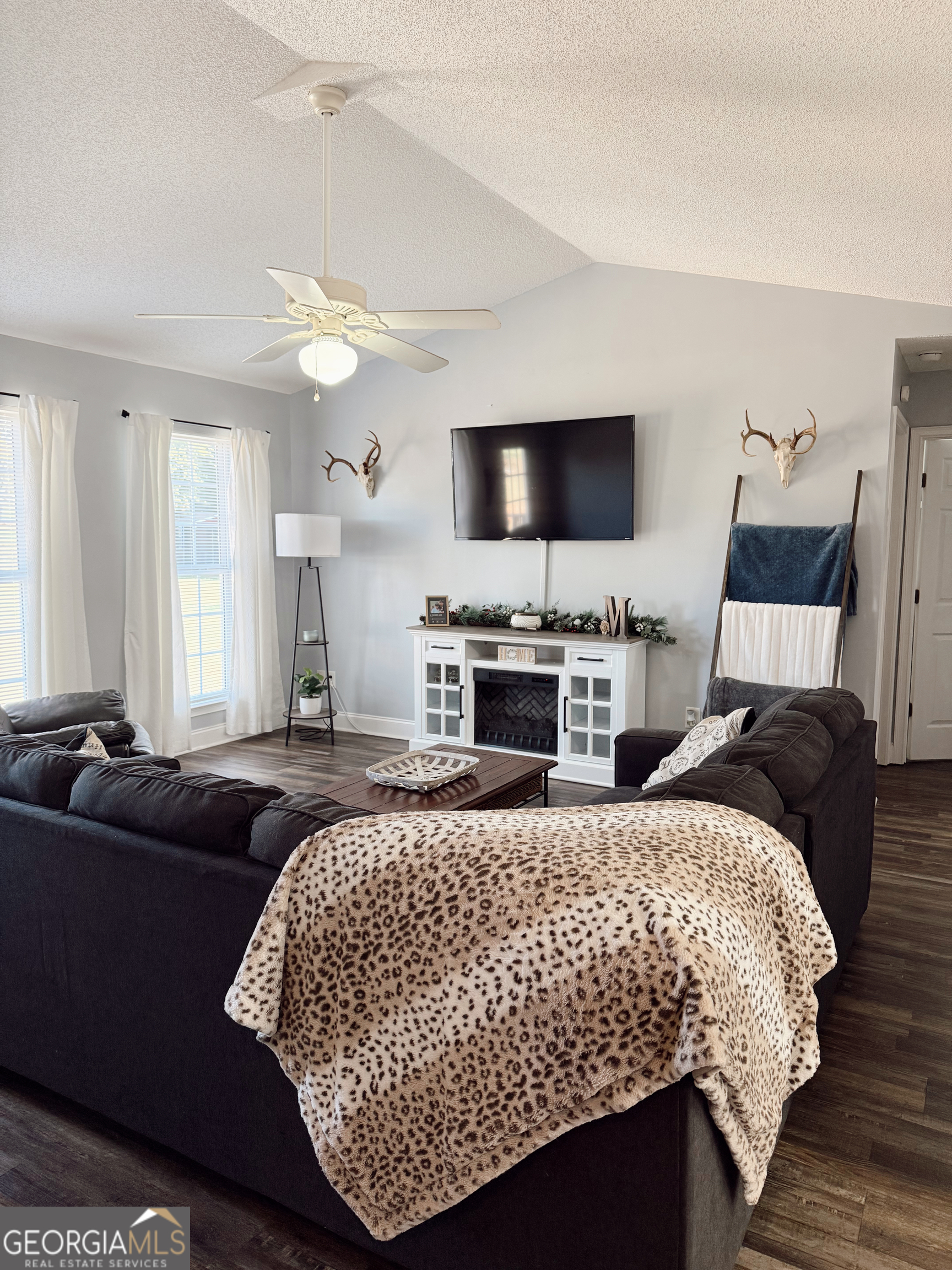 44 Quail Knoll Lane Cleveland, GA 30528 - Photo 7 of 42 a bed sitting in a bedroom and a flat screen tv