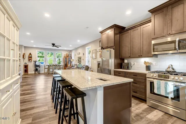 a view of a balcony with furniture