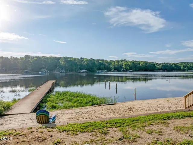 a view of a backyard with sitting area