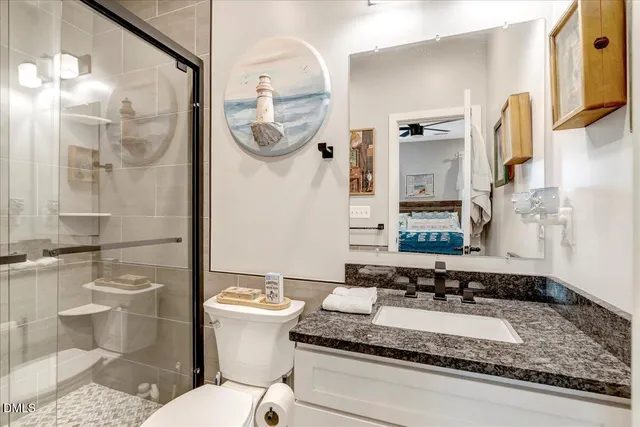 a view of a park with large trees