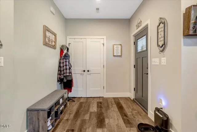 a view of front door with outdoor seating