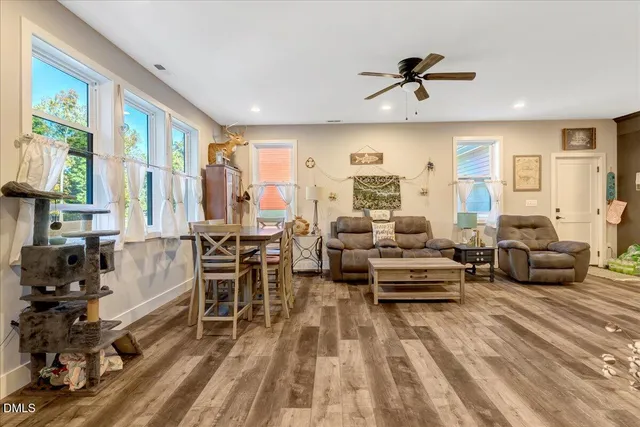 a view of an entryway with wooden floor