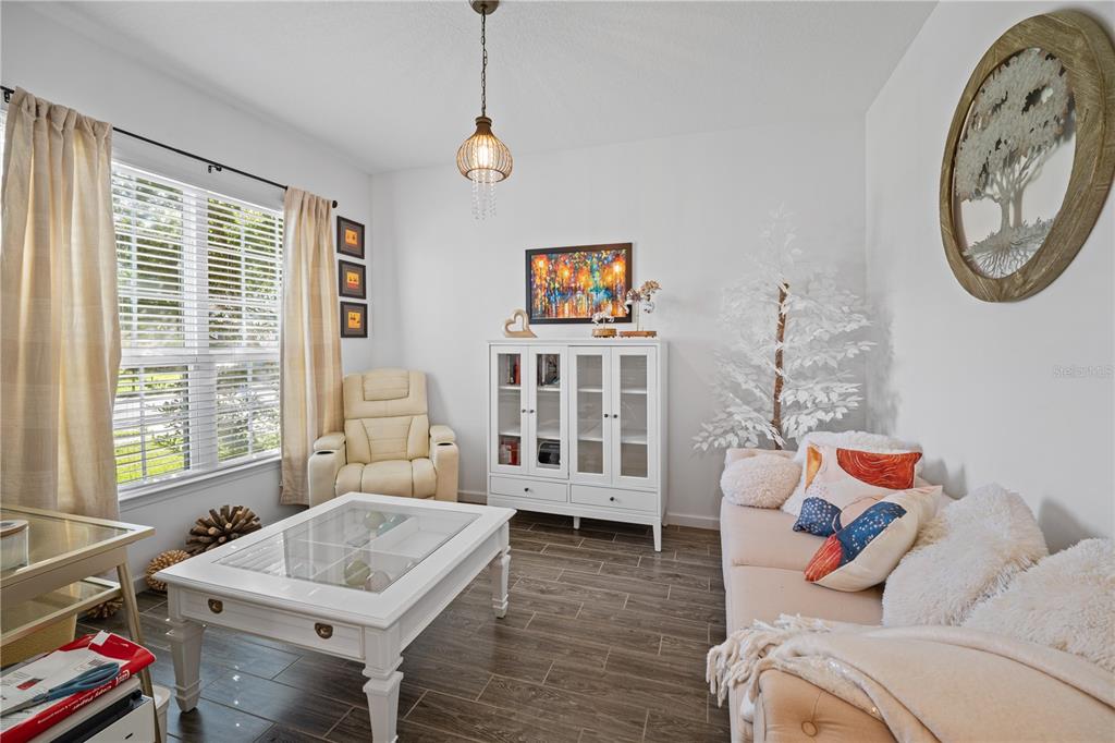 1722 Reflection Lane St. Cloud, FL 34771 - Photo 5 of 26 a living room with furniture and a window