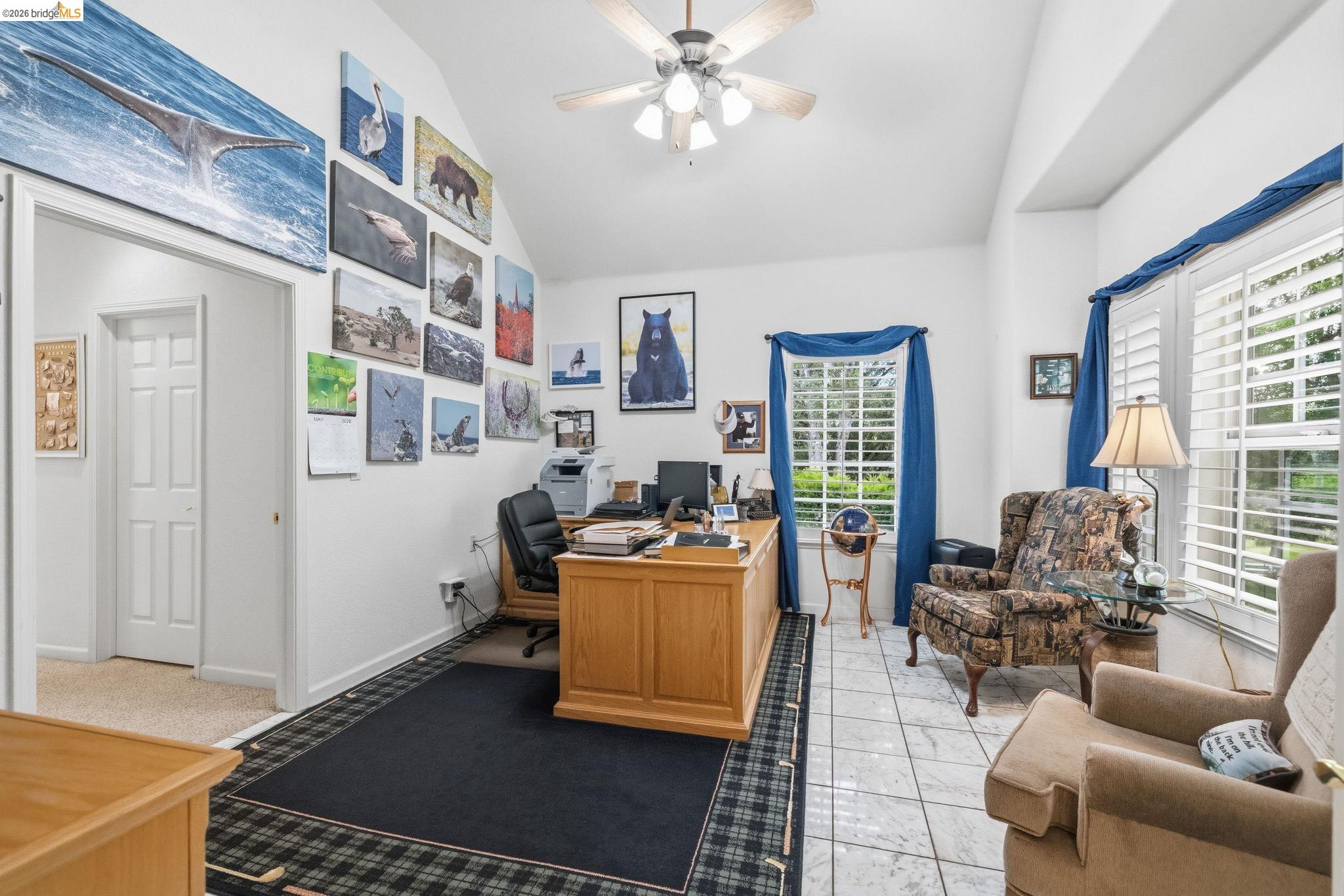 18450 Lambert Lake Road Sonora, CA 95370 - Photo 20 of 87 Room featuring a vaulted ceiling and a ceiling fan with integrated lighting