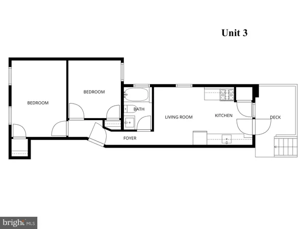 a kitchen with stainless steel appliances white cabinets and a stove top oven