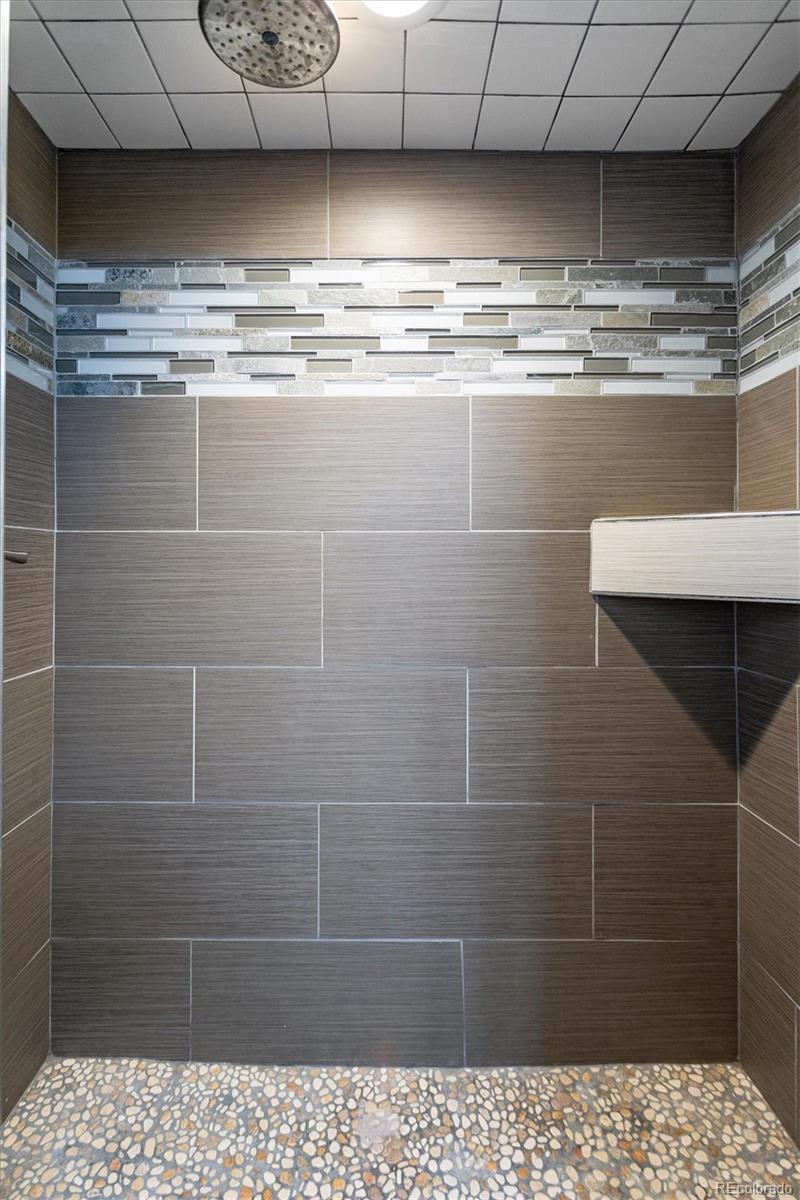 1610 South Cook Street Denver, CO 80210 - Photo 24 of 37 a bathroom with a shower