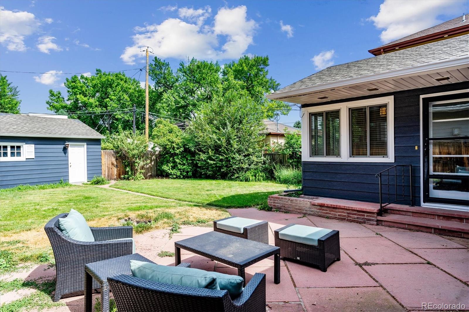 1610 South Cook Street Denver, CO 80210 - Photo 29 of 37 a view of a house with backyard and sitting area