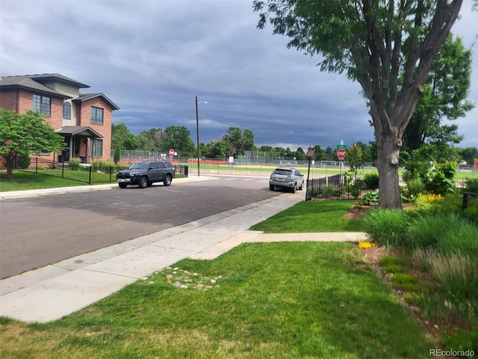 1610 South Cook Street Denver, CO 80210 - Photo 37 of 37 a view of a street with a car parked in front of it