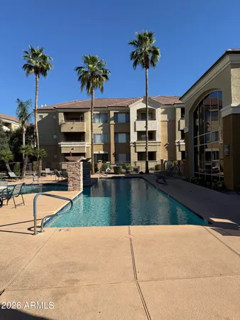 a view of outdoor space with swimming pool