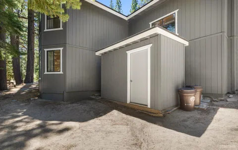 a backyard of a house with yard and outdoor seating
