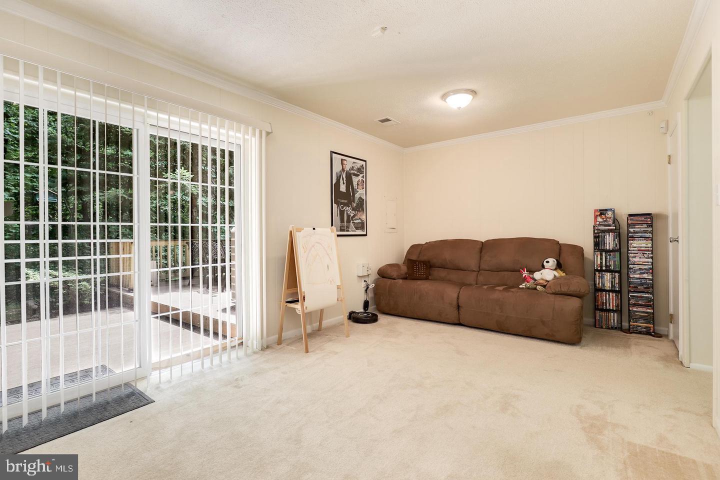 16031 Dorset Road, Unit 161 Laurel, MD 20707 - Photo 22 of 25 a living room with furniture and a window