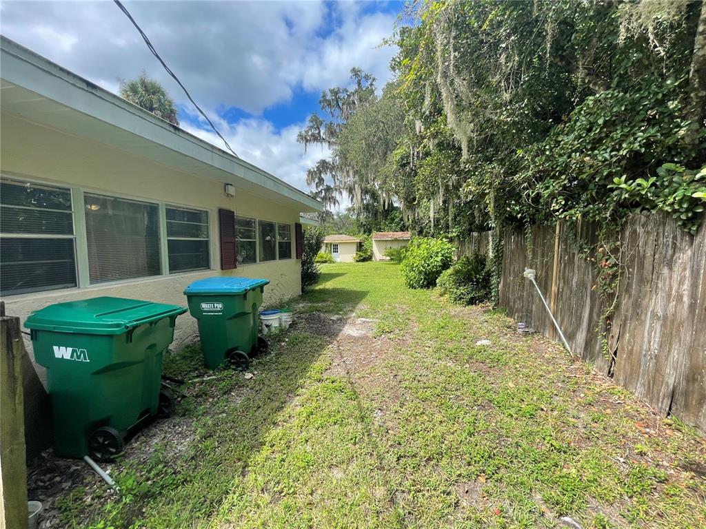 11636 Osceola Road Dunnellon, FL 34431 - Photo 28 of 34 a view of a house with backyard and sitting area