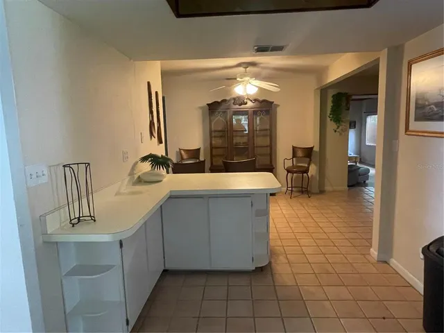 a bathroom with a sink a mirror and shower