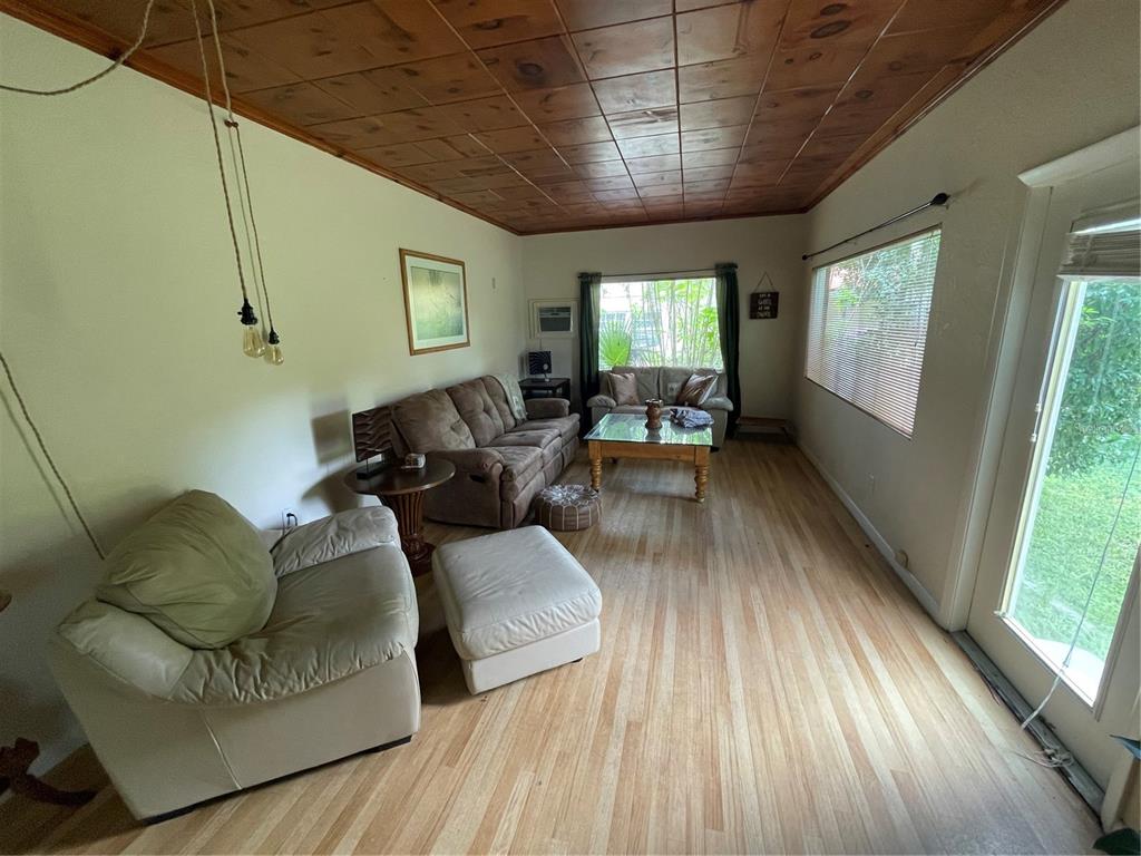 11636 Osceola Road Dunnellon, FL 34431 - Photo 10 of 34 a living room with furniture and a large window