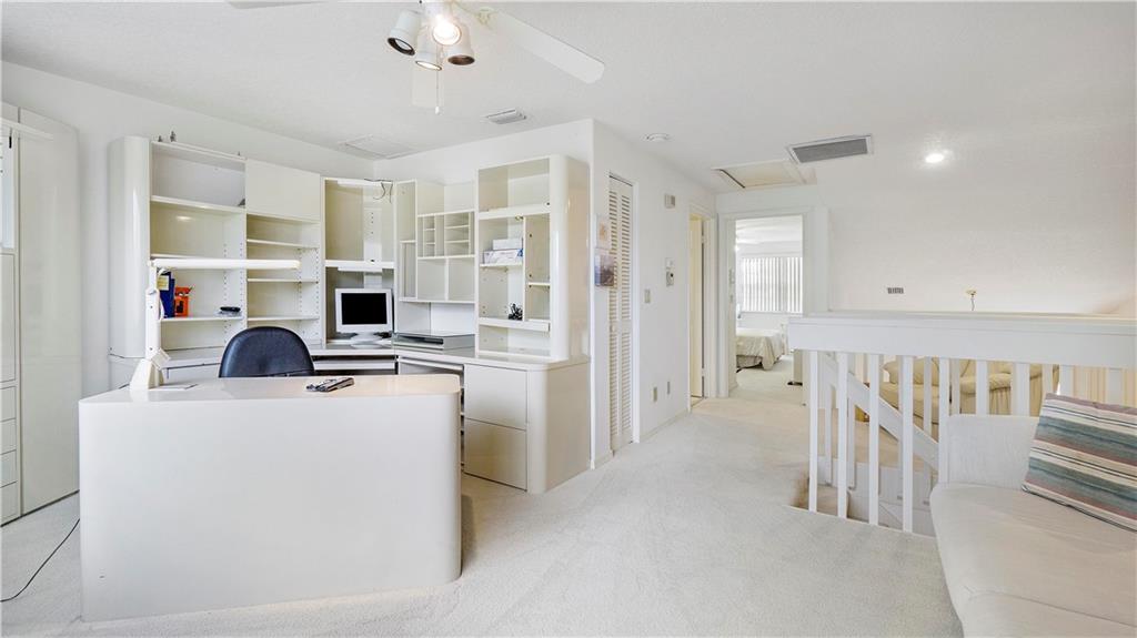 17210 Boca Club Boulevard, Unit 103 Boca Raton, FL 33487 - Photo 11 of 15 a view of kitchen and living room