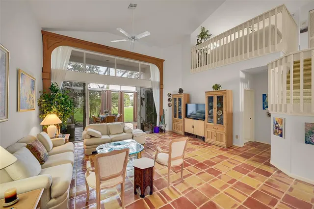 a kitchen with stainless steel appliances a refrigerator and a stove top oven