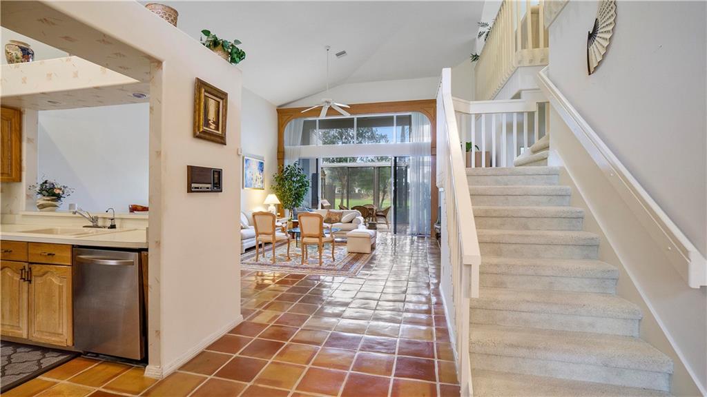 17210 Boca Club Boulevard, Unit 103 Boca Raton, FL 33487 - Photo 10 of 15 a view of a livingroom with furniture and workspace