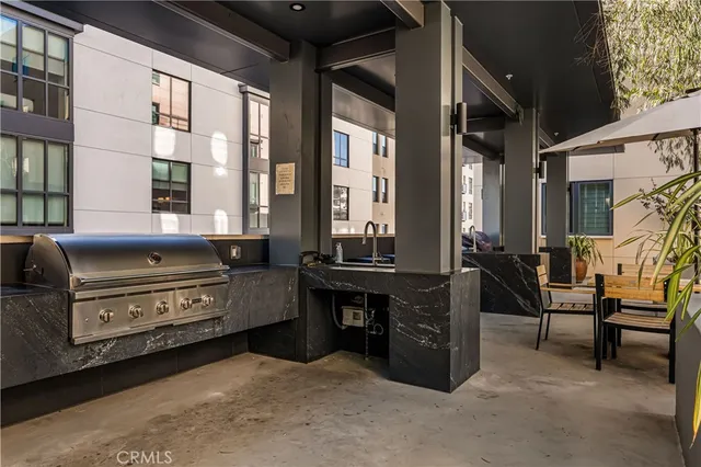 a room with furniture and a large window