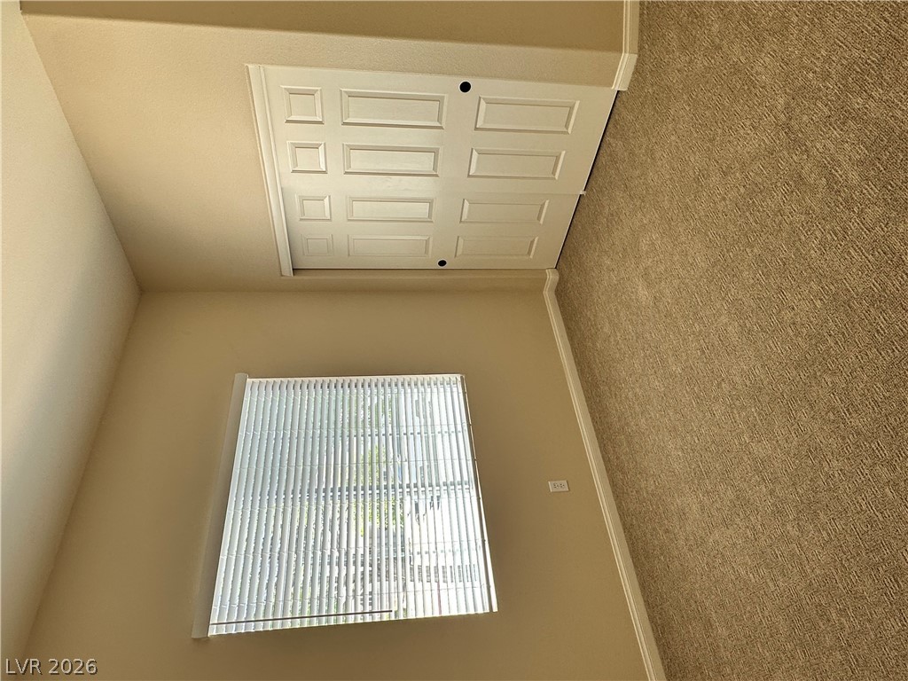 1922 Thunder Ridge Circle Henderson, NV 89012 - Photo 13 of 27 A windowed space with new carpets and a closet awaits your personal touch.