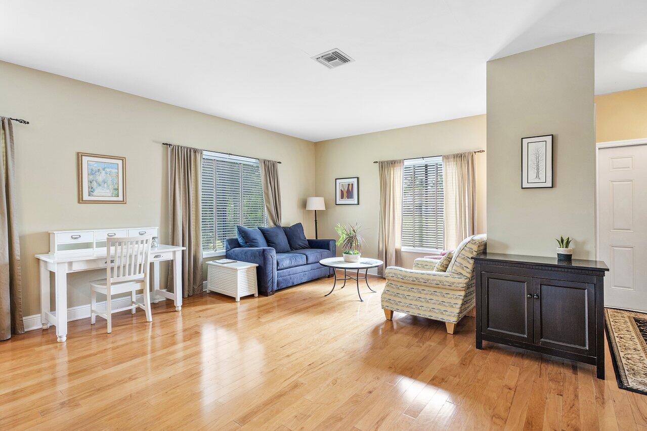 11842 Island Lakes Lane Boca Raton, FL 33498 - Photo 8 of 49 a living room with furniture and wooden floor