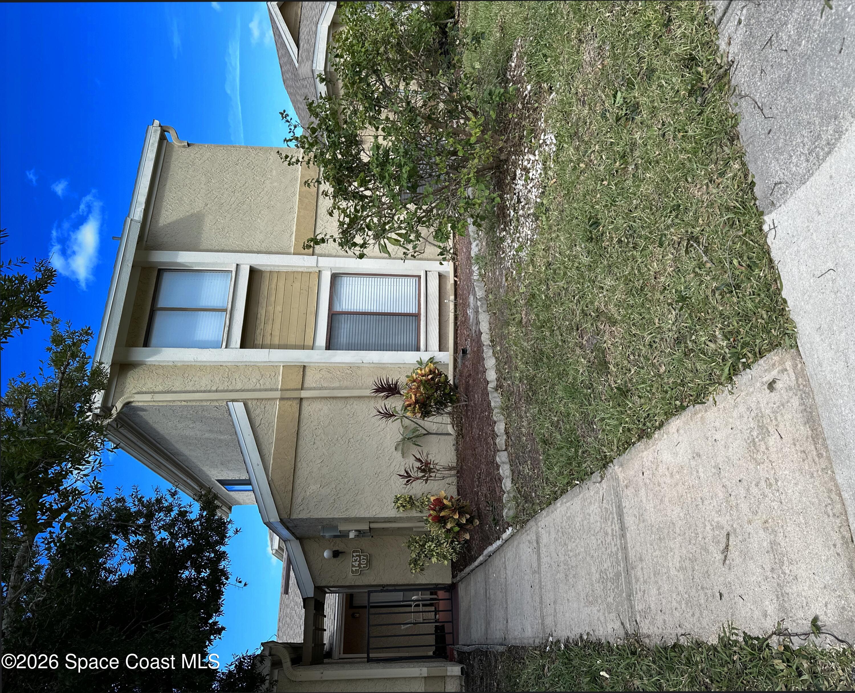 1431 Sheafe Avenue Northeast, Unit 107 Palm Bay, FL 32905 - Photo 1 of 17 Front View of Property