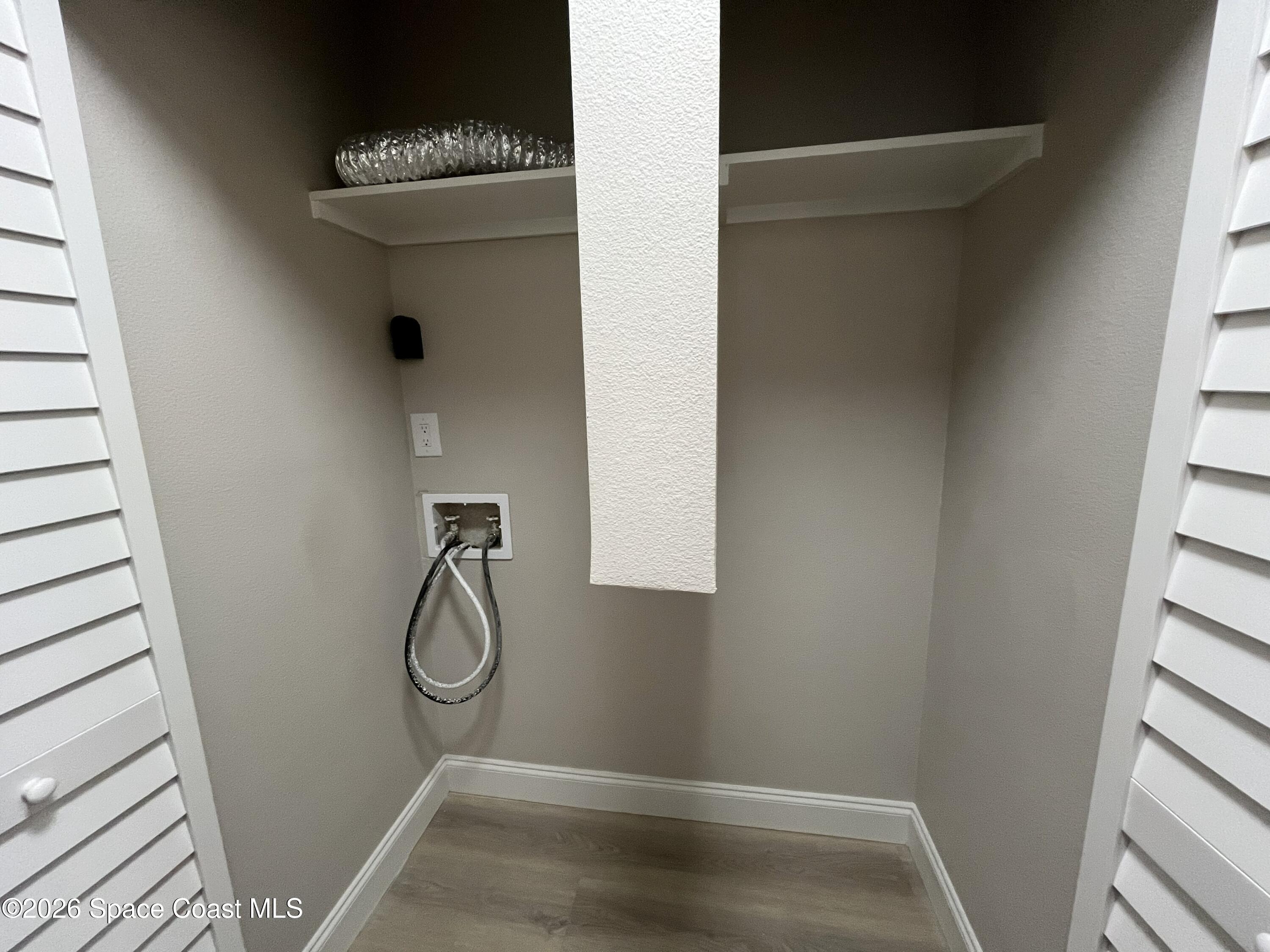 1431 Sheafe Avenue Northeast, Unit 107 Palm Bay, FL 32905 - Photo 13 of 17 Laundry