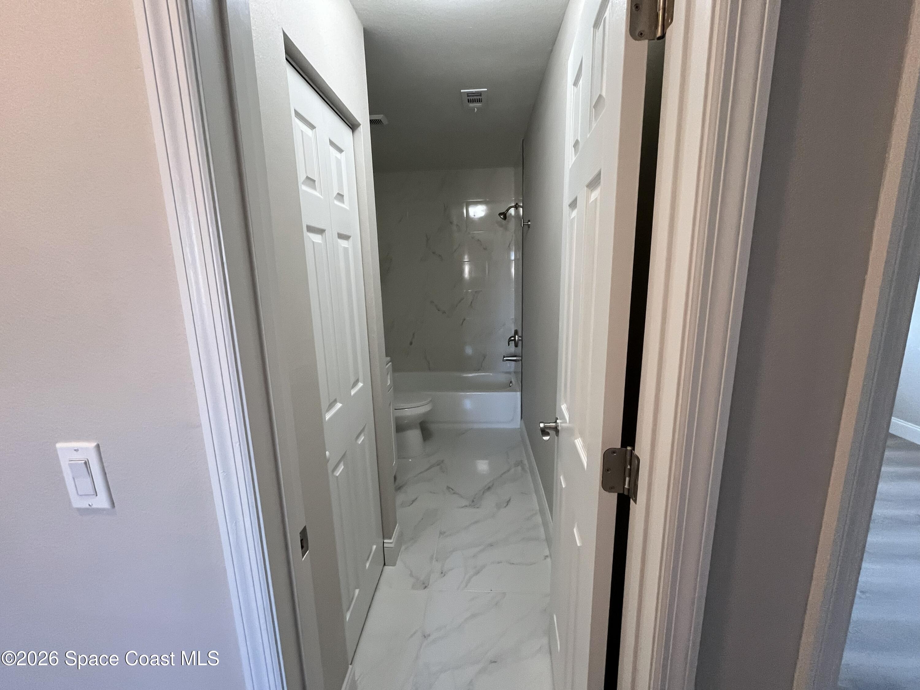 1431 Sheafe Avenue Northeast, Unit 107 Palm Bay, FL 32905 - Photo 17 of 17 UpStr Bath