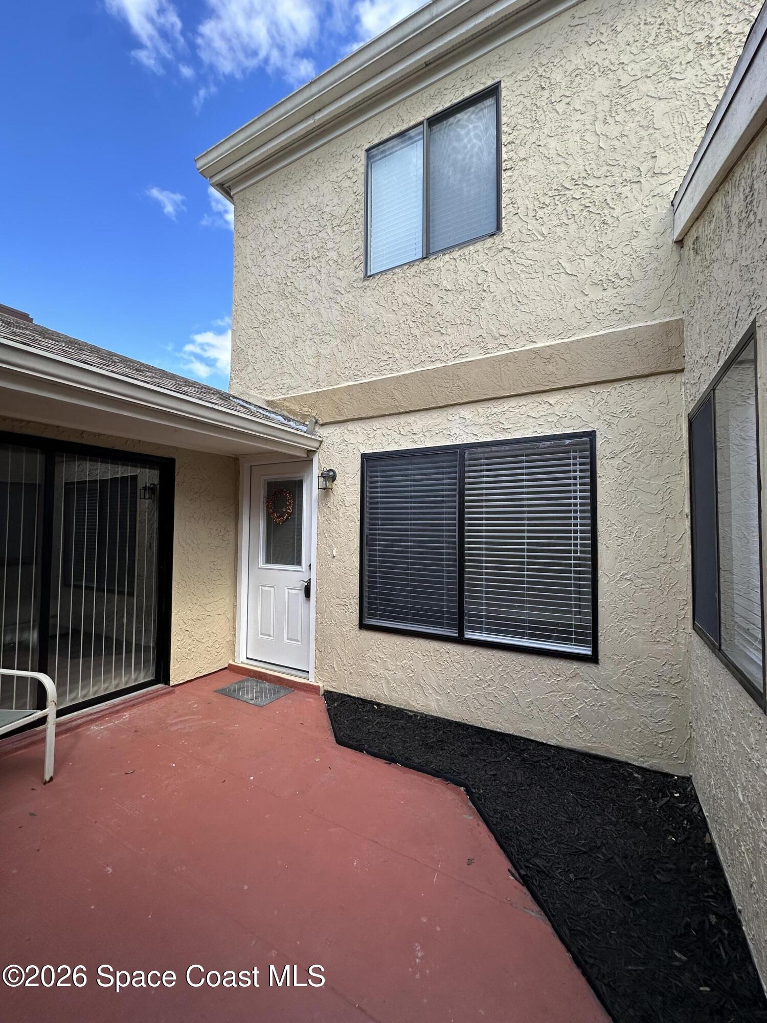 1431 Sheafe Avenue Northeast, Unit 107 Palm Bay, FL 32905 - Photo 2 of 17 1431 Sheafe Patio