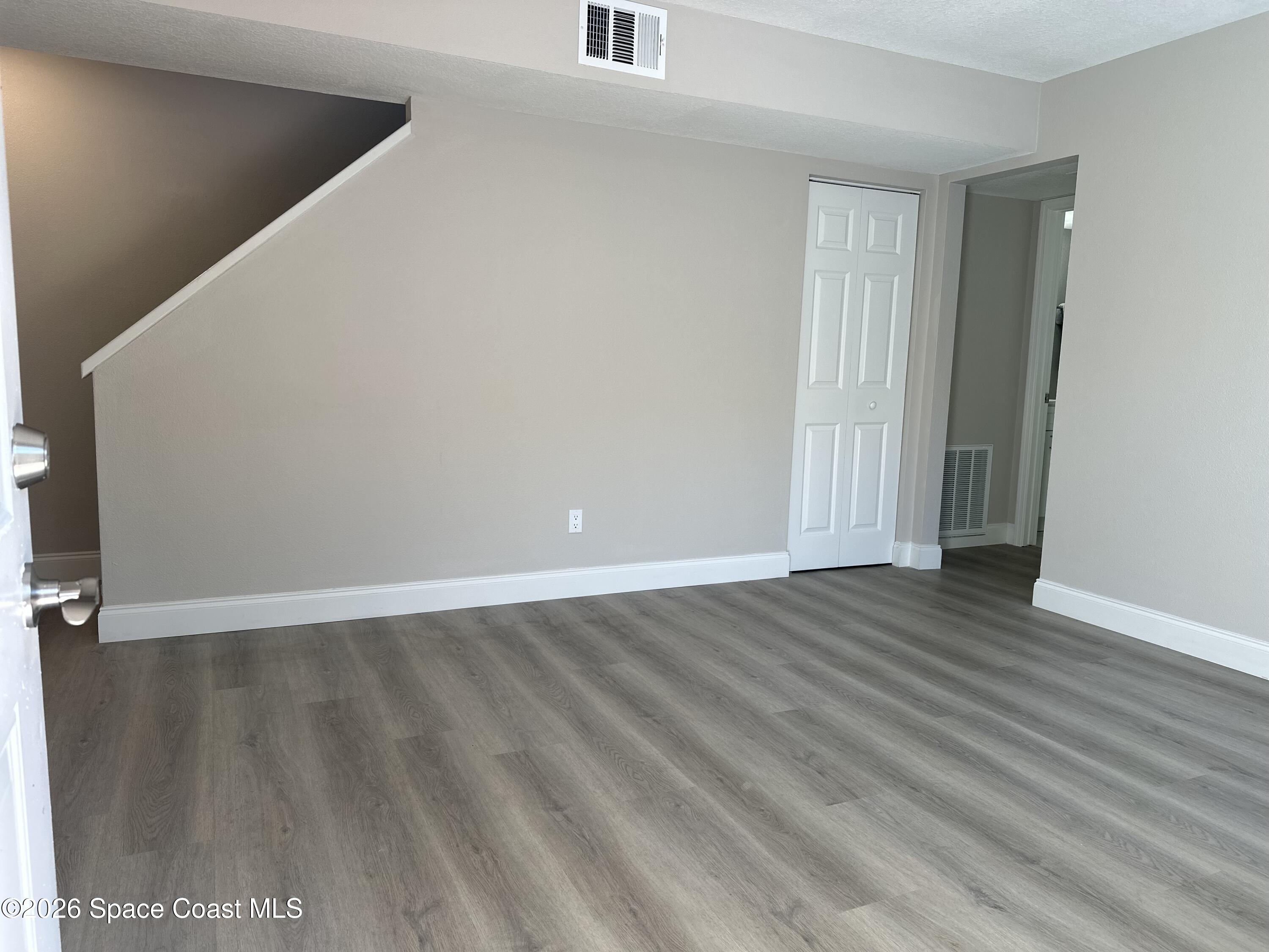 1431 Sheafe Avenue Northeast, Unit 107 Palm Bay, FL 32905 - Photo 3 of 17 1st Floor Entry