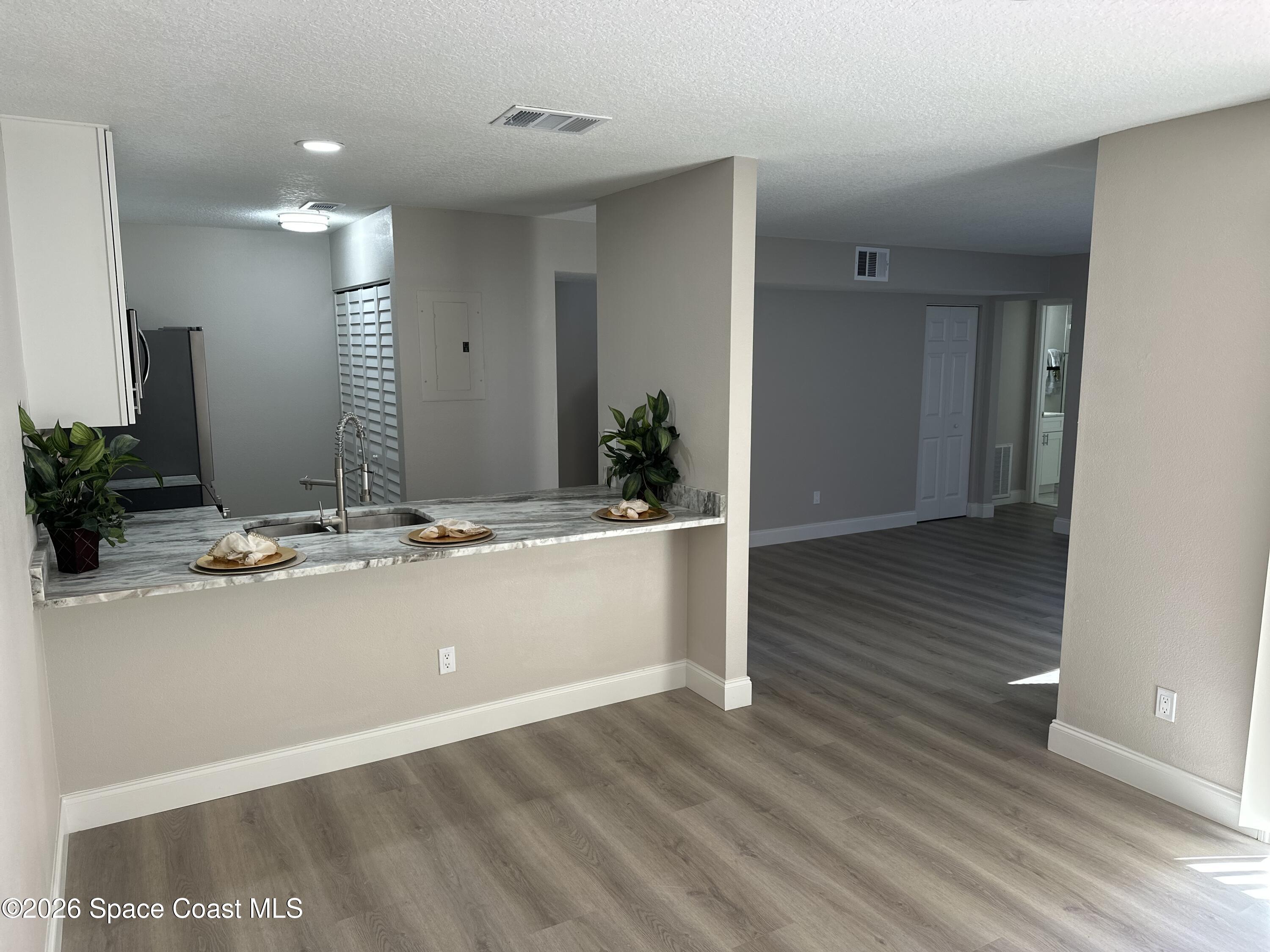 1431 Sheafe Avenue Northeast, Unit 107 Palm Bay, FL 32905 - Photo 6 of 17 IMG_6314