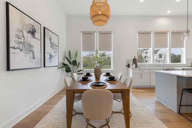 a work room with furniture and a window