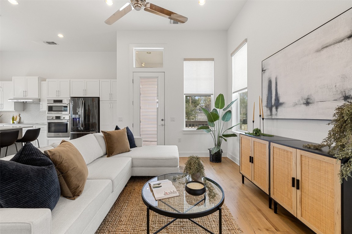 4400 Night Owl Lane Austin, TX 78723 - Photo 2 of 40 a living room with furniture and a table