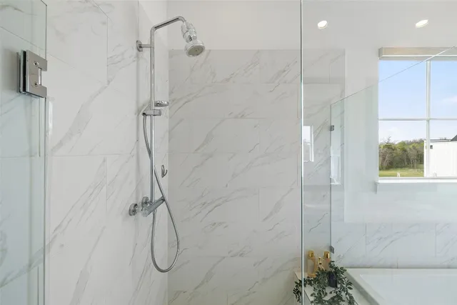 a bathroom with a sink a toilet and shower curtain