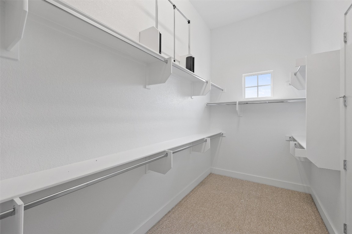 4400 Night Owl Lane Austin, TX 78723 - Photo 27 of 40 a view of an empty walk in closet