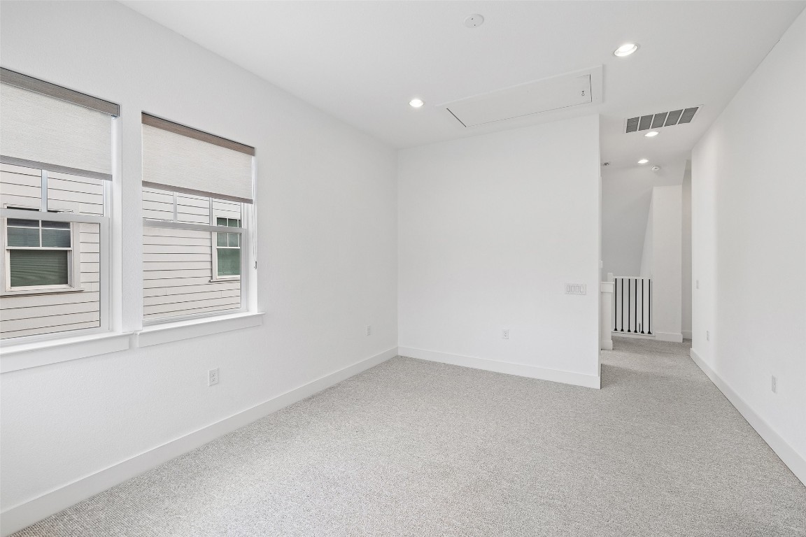 4400 Night Owl Lane Austin, TX 78723 - Photo 28 of 40 a view of an empty room with a window