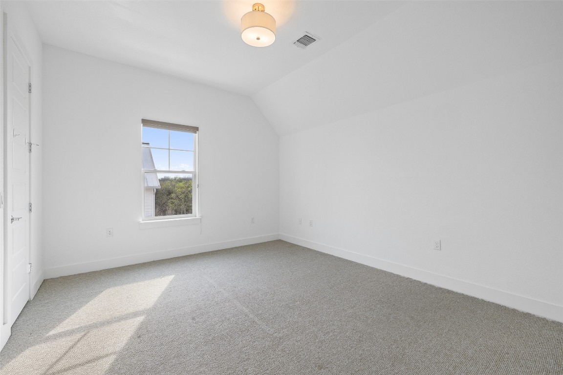 4400 Night Owl Lane Austin, TX 78723 - Photo 31 of 40 an empty room with a window