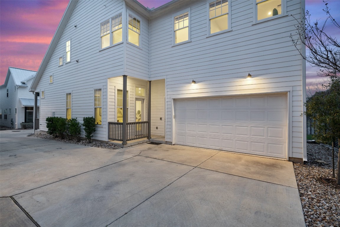4400 Night Owl Lane Austin, TX 78723 - Photo 37 of 40 a view of a house with garage and plants