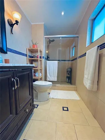 a hallway with a washer and dryer