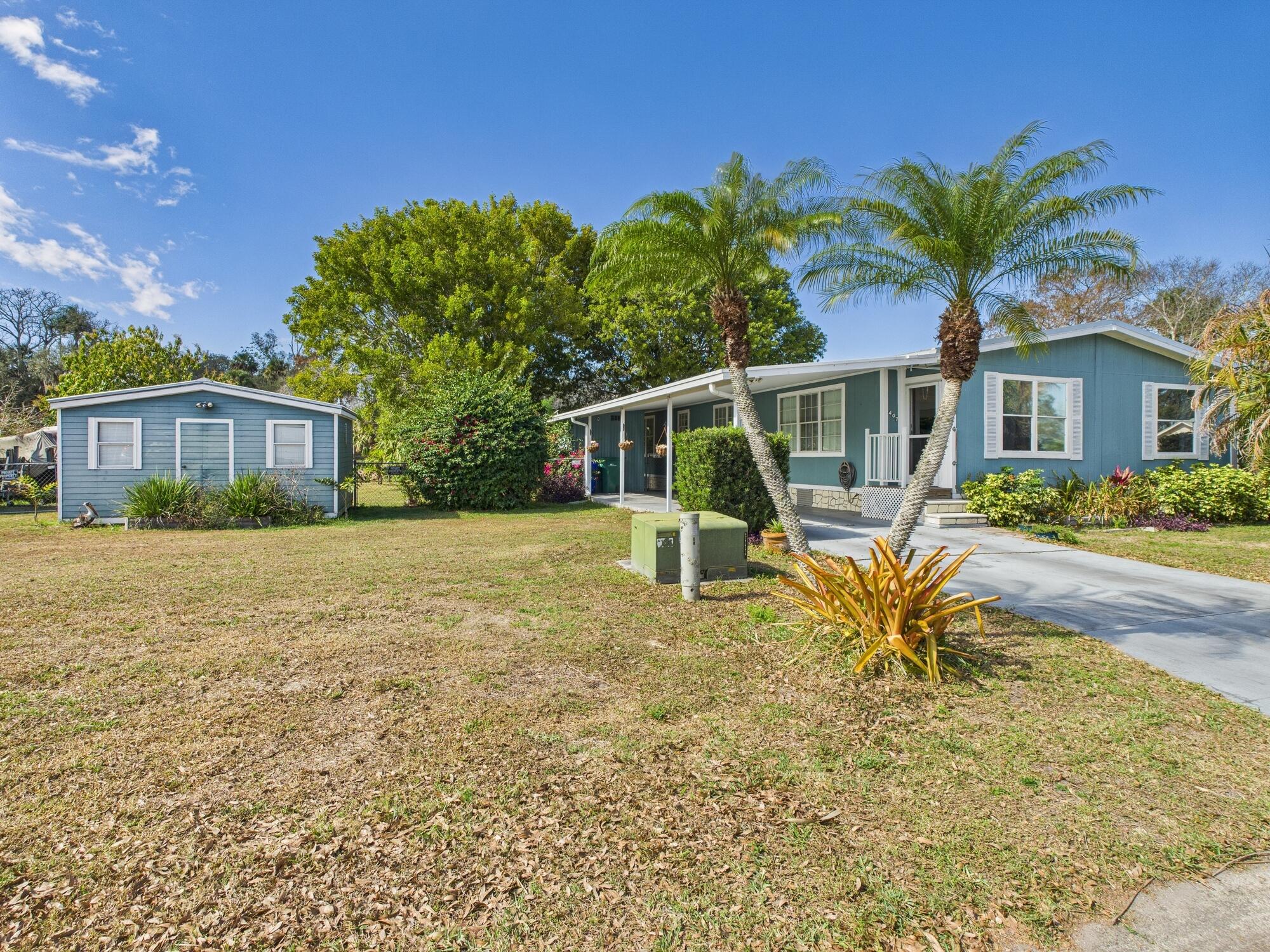 407 Northeast 8th Avenue Okeechobee, FL 34972 - Photo 1 of 65 CAM03600G0-PR0077-STILL008