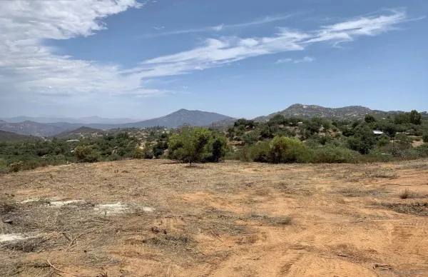 a view of an outdoor space and mountain view