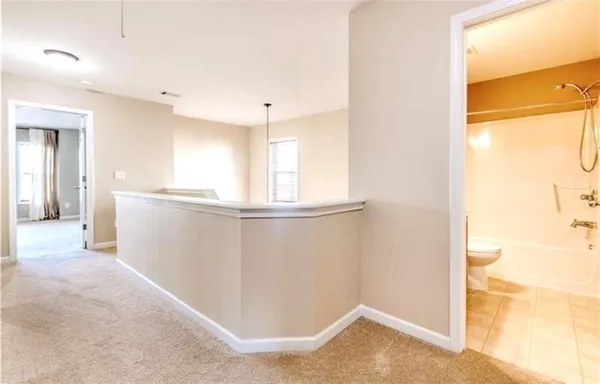 a view of a kitchen with a fridge