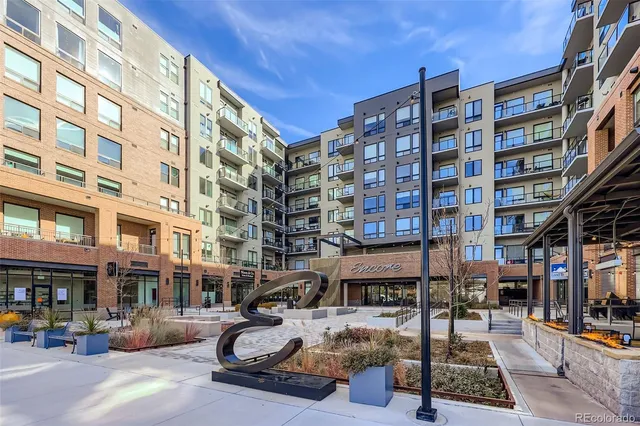 a car parked in front of a building