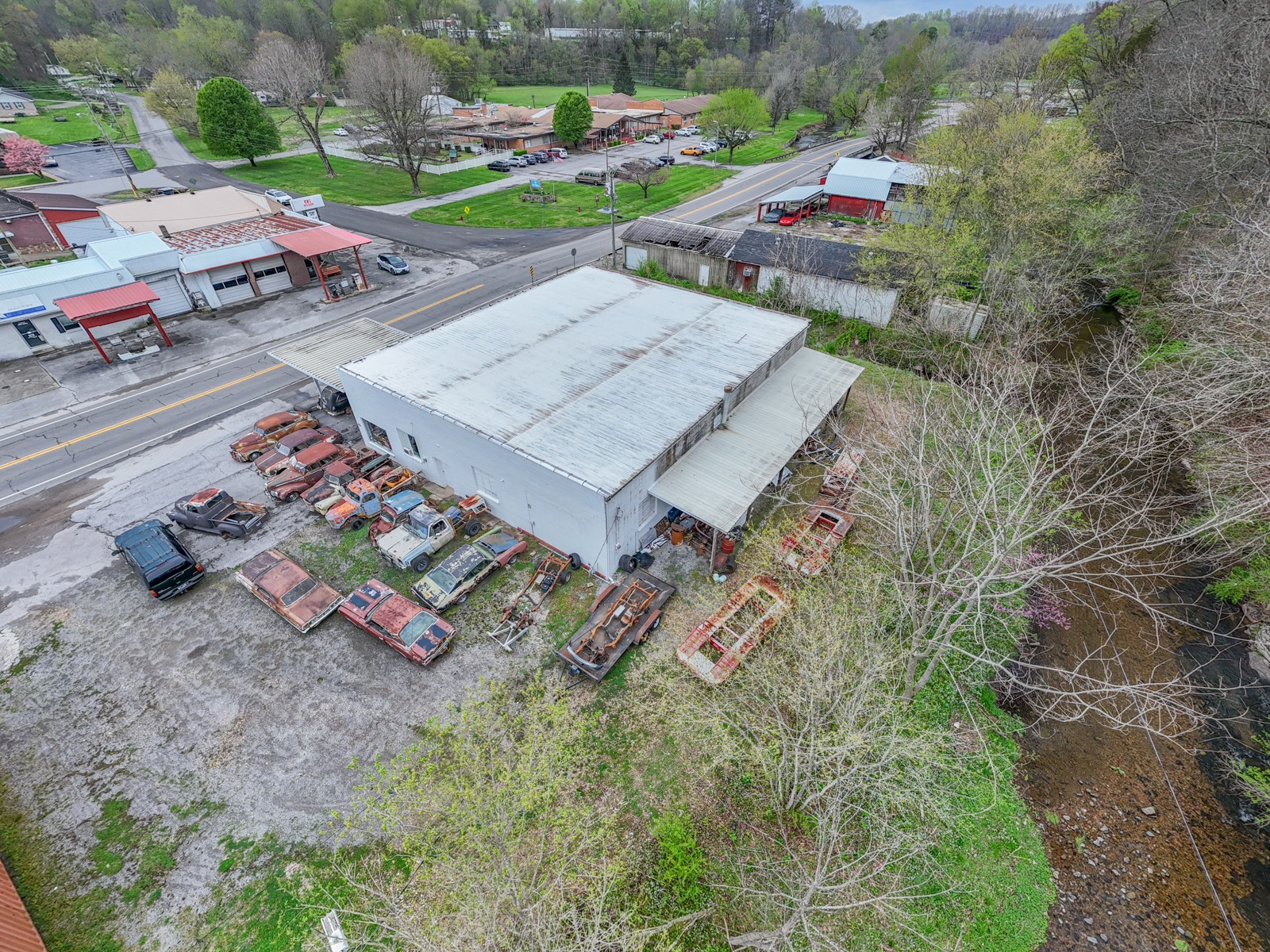 290 Main Street Red Boiling Springs, TN 37150 - Photo 3 of 34 an aerial view of a city with lots of trees