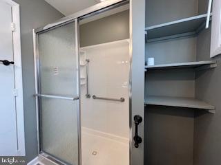 221 Hempt Road Mechanicsburg, PA 17050 - Photo 14 of 29 a bathroom with a glass shower door
