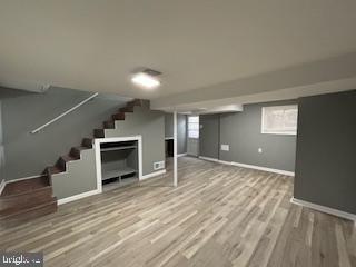 221 Hempt Road Mechanicsburg, PA 17050 - Photo 18 of 29 a view of empty room with wooden floor and fireplace