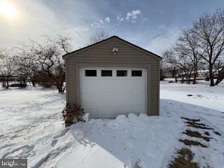221 Hempt Road Mechanicsburg, PA 17050 - Photo 23 of 29 a front view of a house with a yard covered in snow