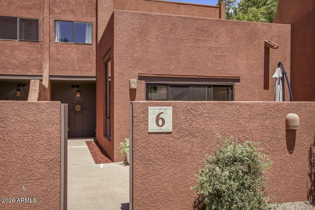 165 Verde Valley School Road, Unit 6 Sedona, AZ 86351 - Photo 3 of 40 a front view of a house with outdoor space