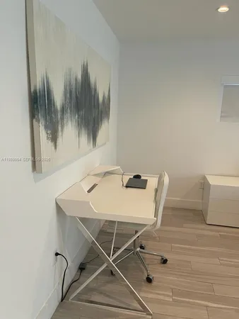 a workspace with furniture and a table