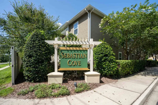 a sign that is on the side of a road