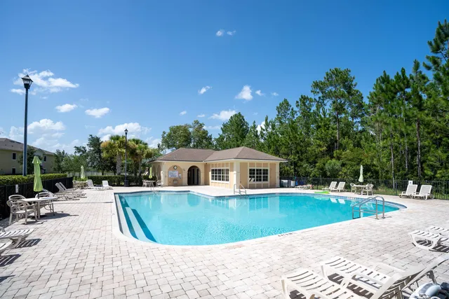 a view of a house with swimming pool